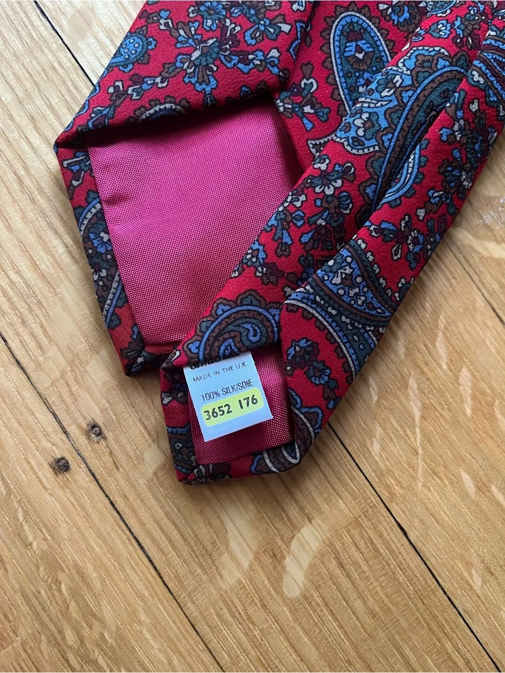Red Paisley Men's Tie with Blue and Brown Accents